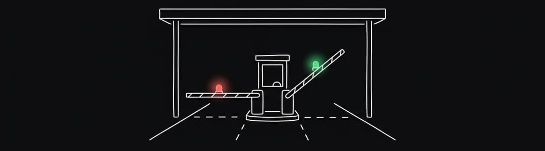 Two toll lanes: red barrier down, green barrier up